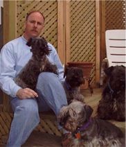 [Dann Wilson w/ 4 of his Cesky Terriers]